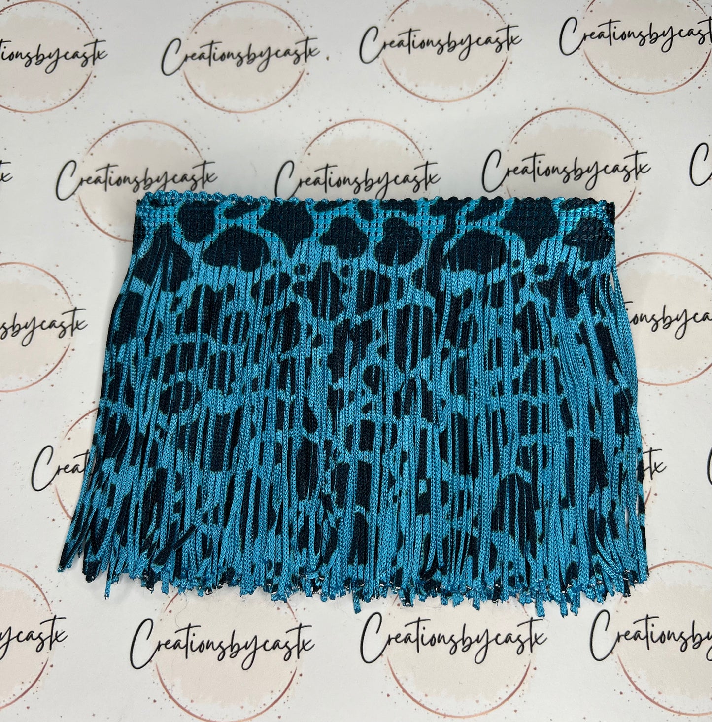 Neon Blue Cow Print Fringe